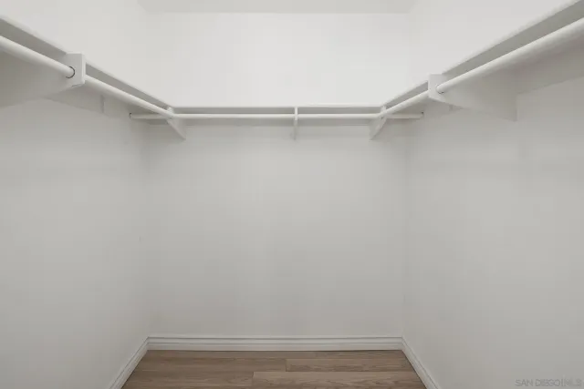 a view of an empty walk in closet