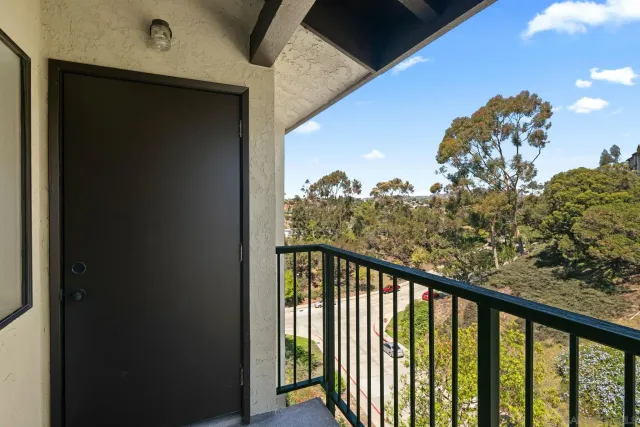 a view of a balcony with outside space