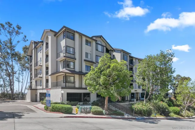 a front view of a building with garden