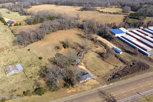 a view of a backyard of a house