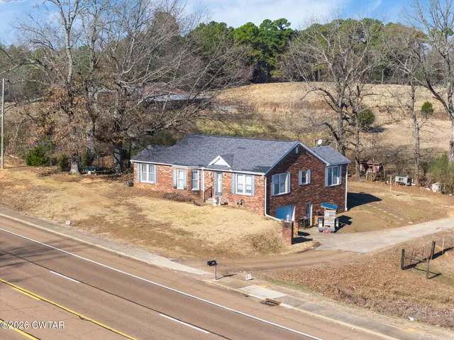 front view of house with a yard