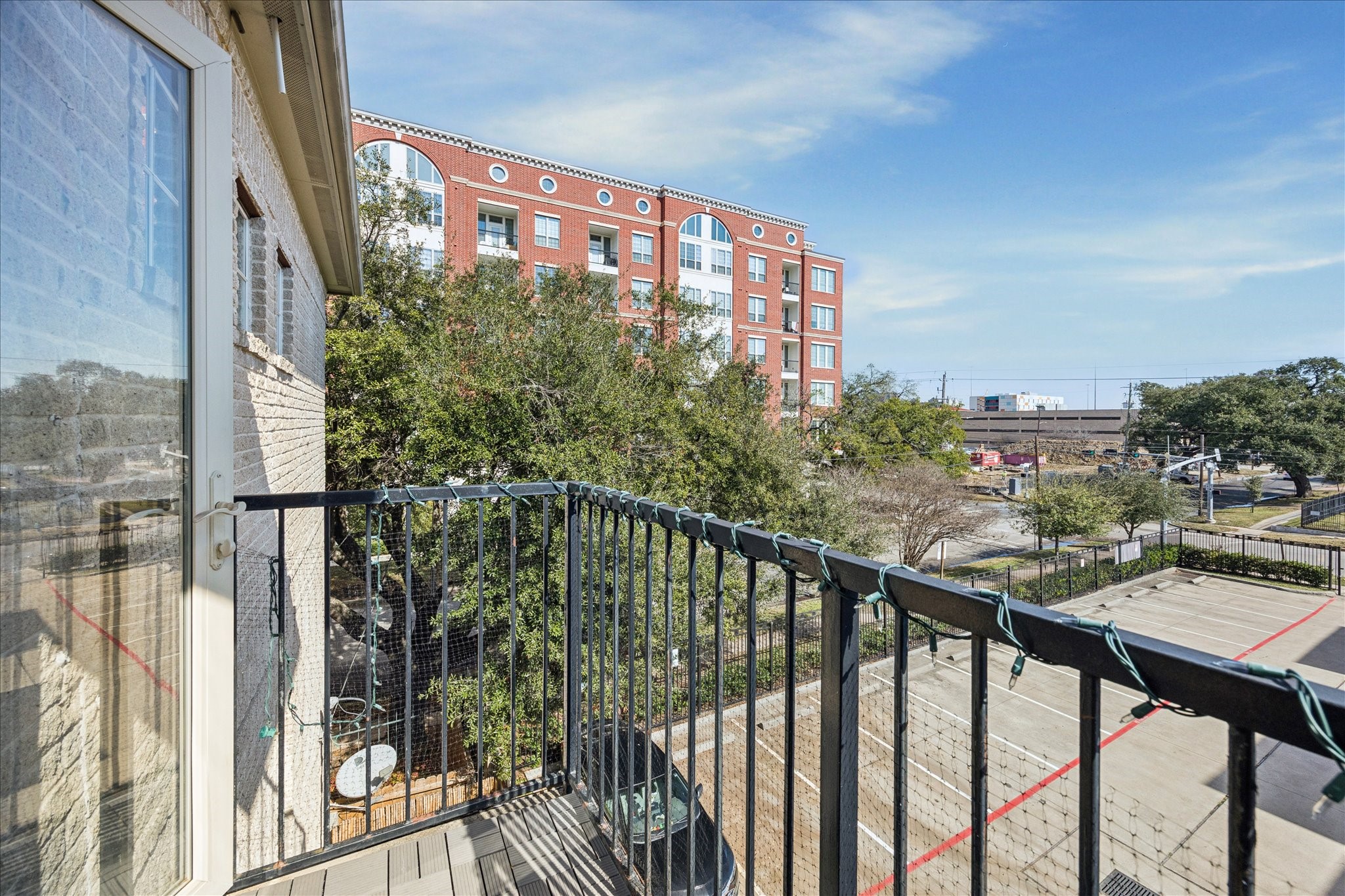2207 Austin Street Houston, TX 77002 - Photo 17 of 34 And this is the balcony off of the 3rd floor primary bedroom.