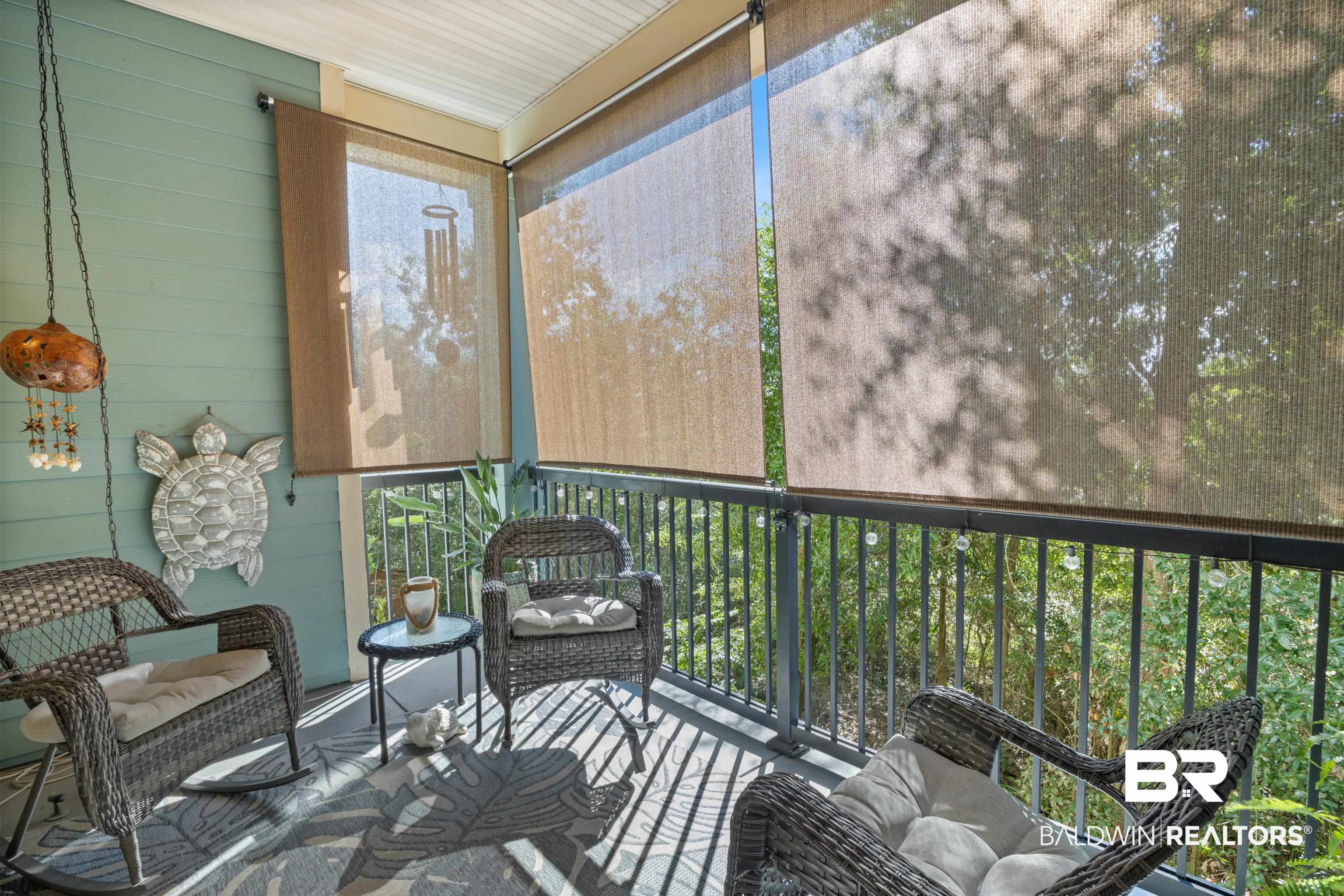 1430 Regency Road, Unit B201 Gulf Shores, AL 36542 - Photo 35 of 59 Sunroom with a balcony