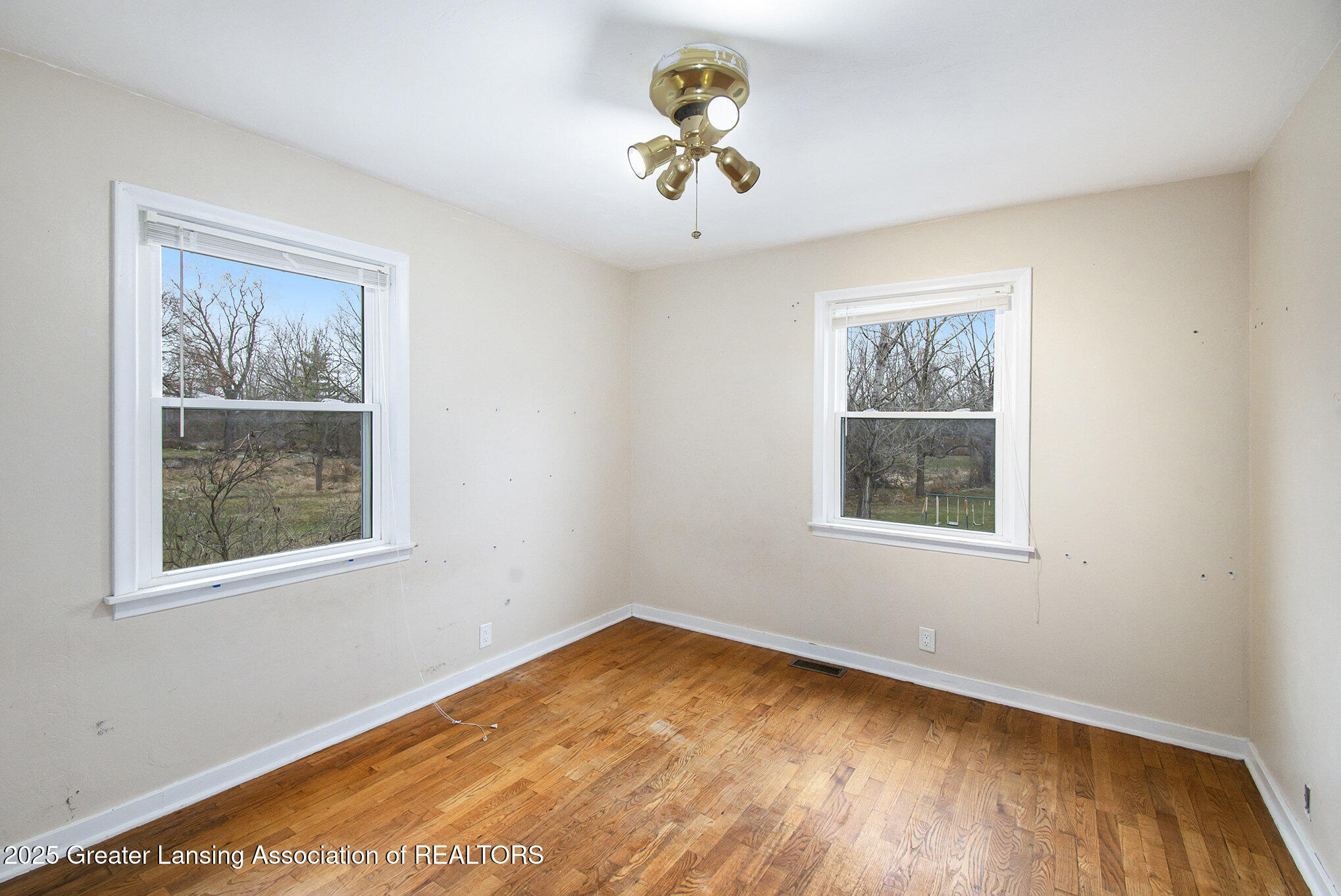 714 West Sheridan Road Lansing, MI 48906 - Photo 9 of 16 Primary Bedroom