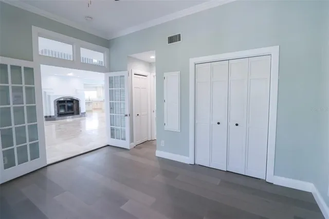 a view of a swimming pool with a yard