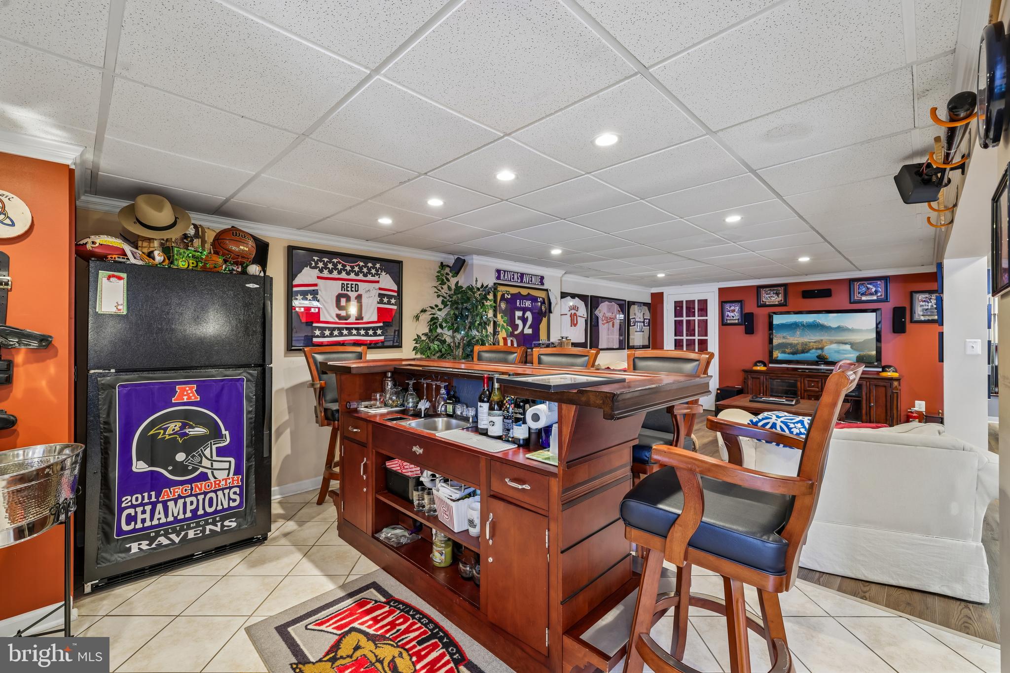 1501 Ritchie Street Annapolis, MD 21401 - Photo 35 of 59 Basement Bar with Sink and Refridgerator