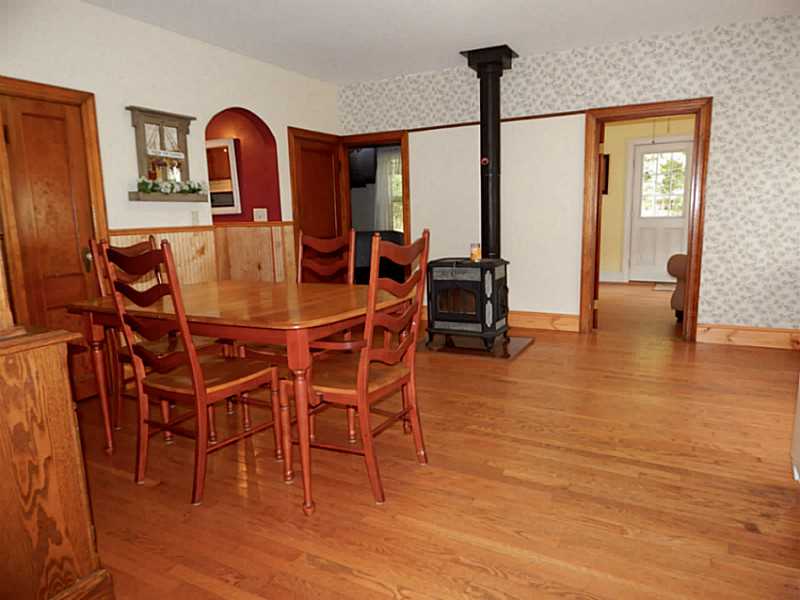 111 Curran Road Cumberland, RI 02864 - Photo 7 of 22 Dining Area. Huge dining area with woodstove.