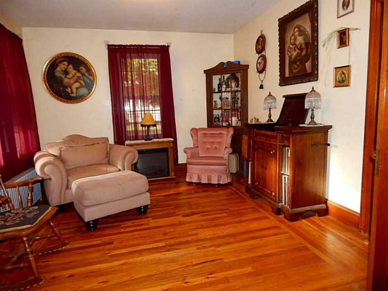 111 Curran Road Cumberland, RI 02864 - Photo 9 of 22 Living Room. Left side of Double Living room