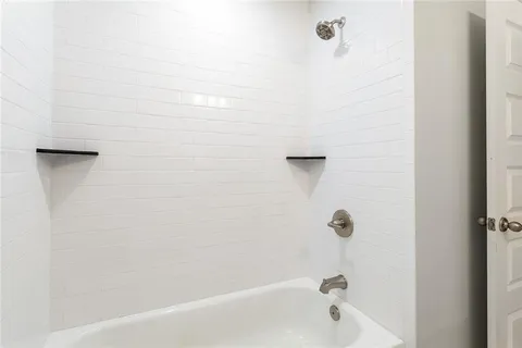 a bathroom with a bathtub