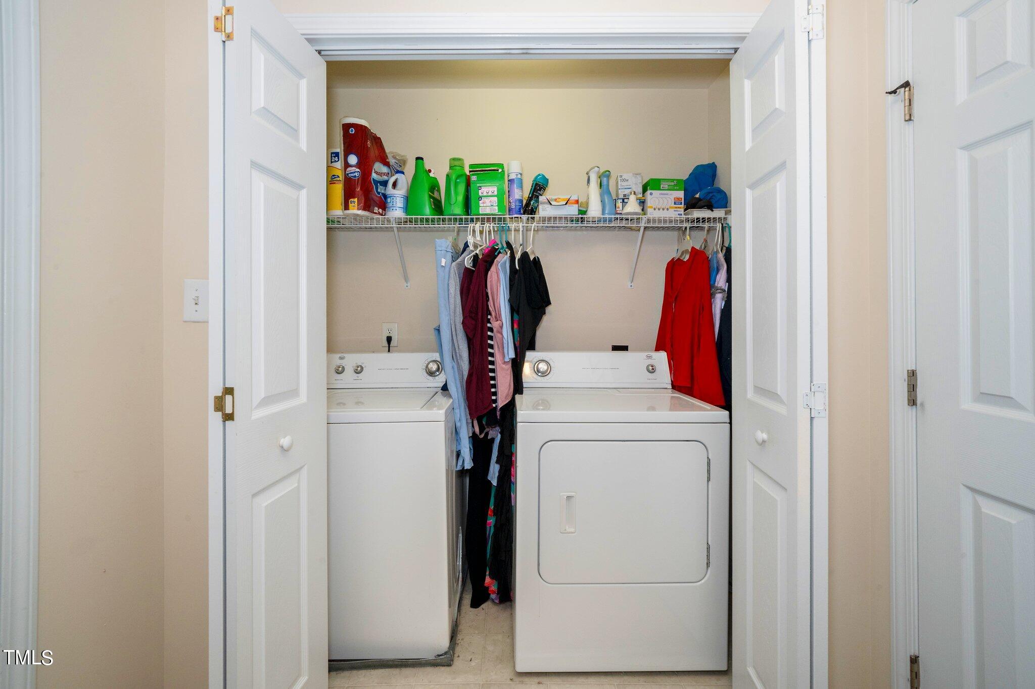 9828 Layla Avenue Raleigh, NC 27617 - Photo 12 of 21 a utility room with dryer and washer