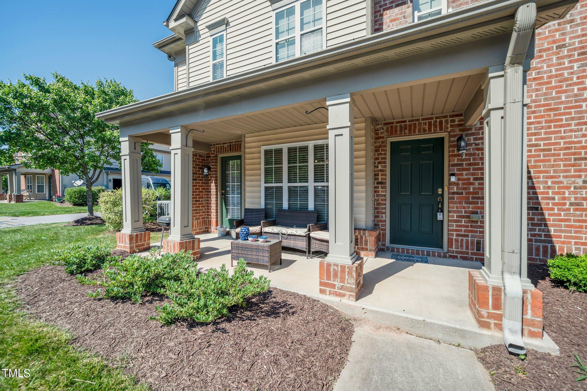 9828 Layla Avenue Raleigh, NC 27617 - Photo 3 of 21 a house view with a outdoor space