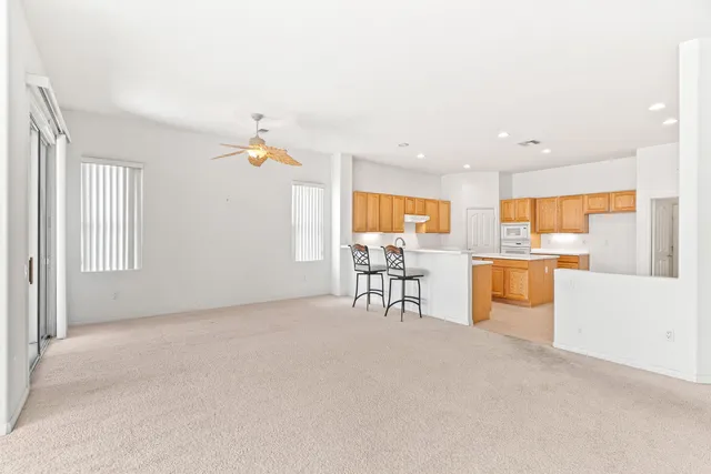 a living room with furniture and a table