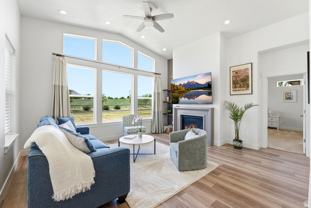 108 West Monte Rosa Lane Midway, UT 84049 - Photo 10 of 48 Vaulted living room featuring wood-finish flooring, a contemporary ceiling fan, and recessed lighting