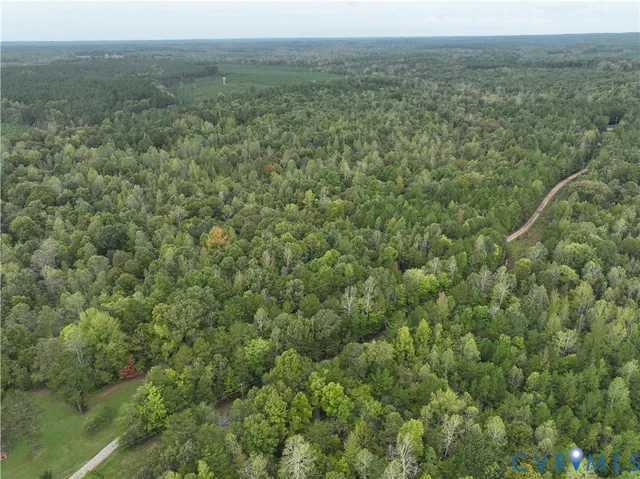 a view of a big yard with green space