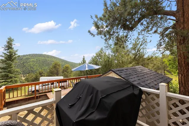 a view of a balcony with chairs