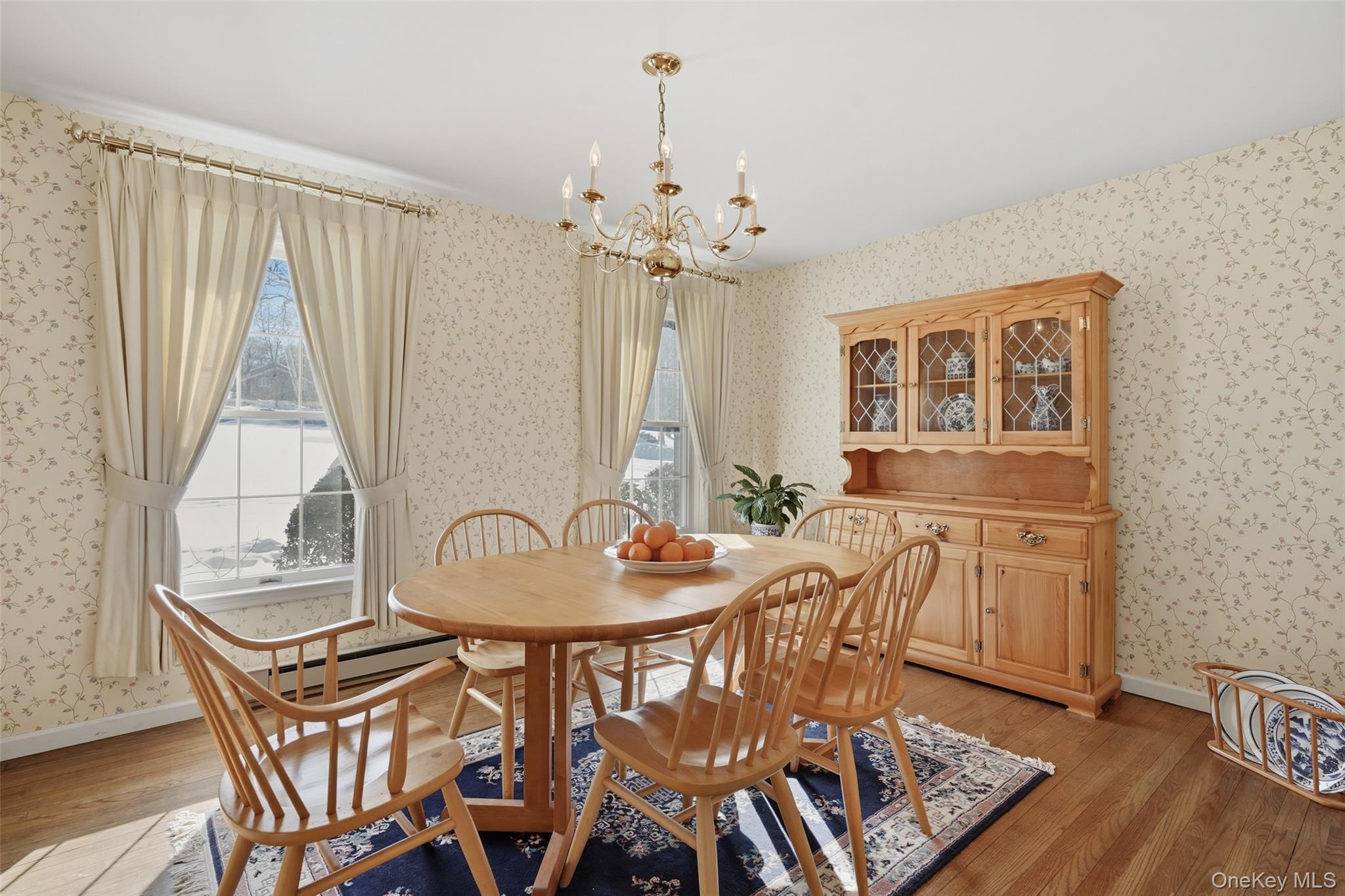 2 Cheyenne Court Katonah, NY 10536 - Photo 4 of 21 Formal dining filled with sunlight.