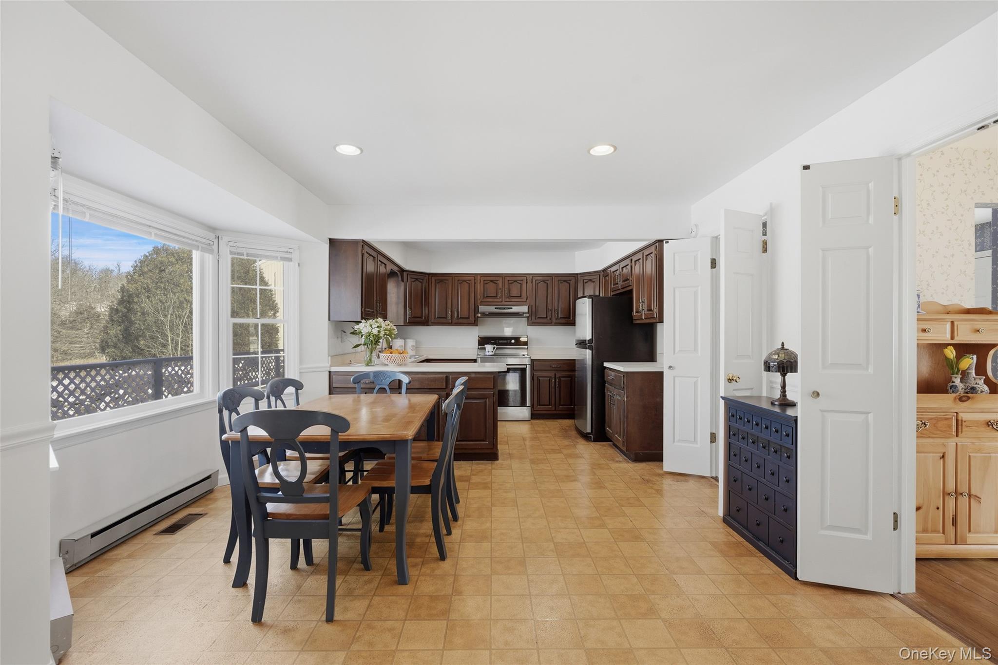 2 Cheyenne Court Katonah, NY 10536 - Photo 6 of 21 This home has great flow. Kitchen opens to dining room and entry hall.