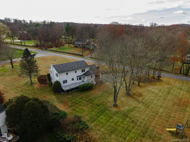 a work room with furniture and a window