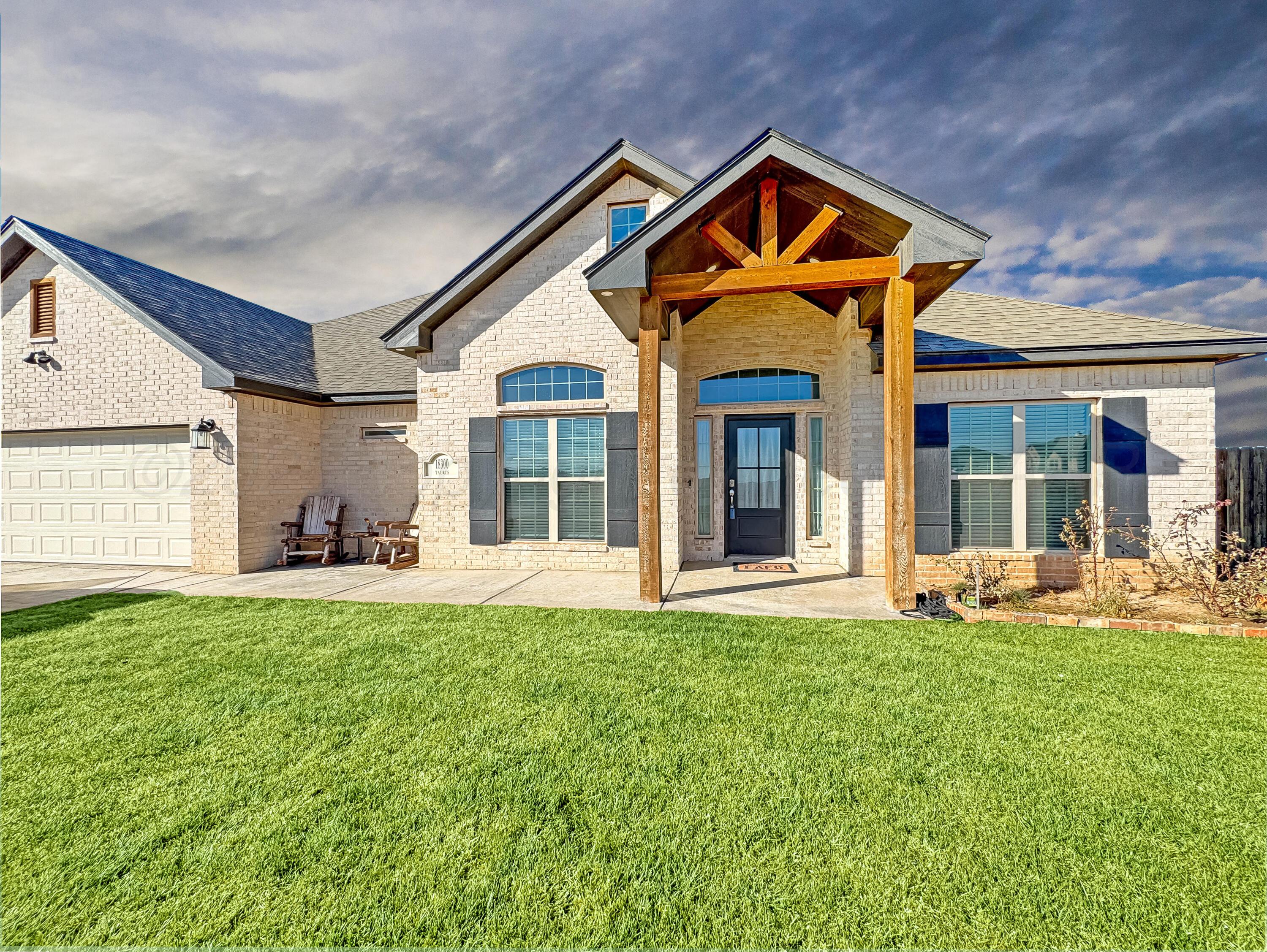 18300 Taurus Trail Canyon, TX 79015 - Photo 1 of 32 a front view of a house with a yard