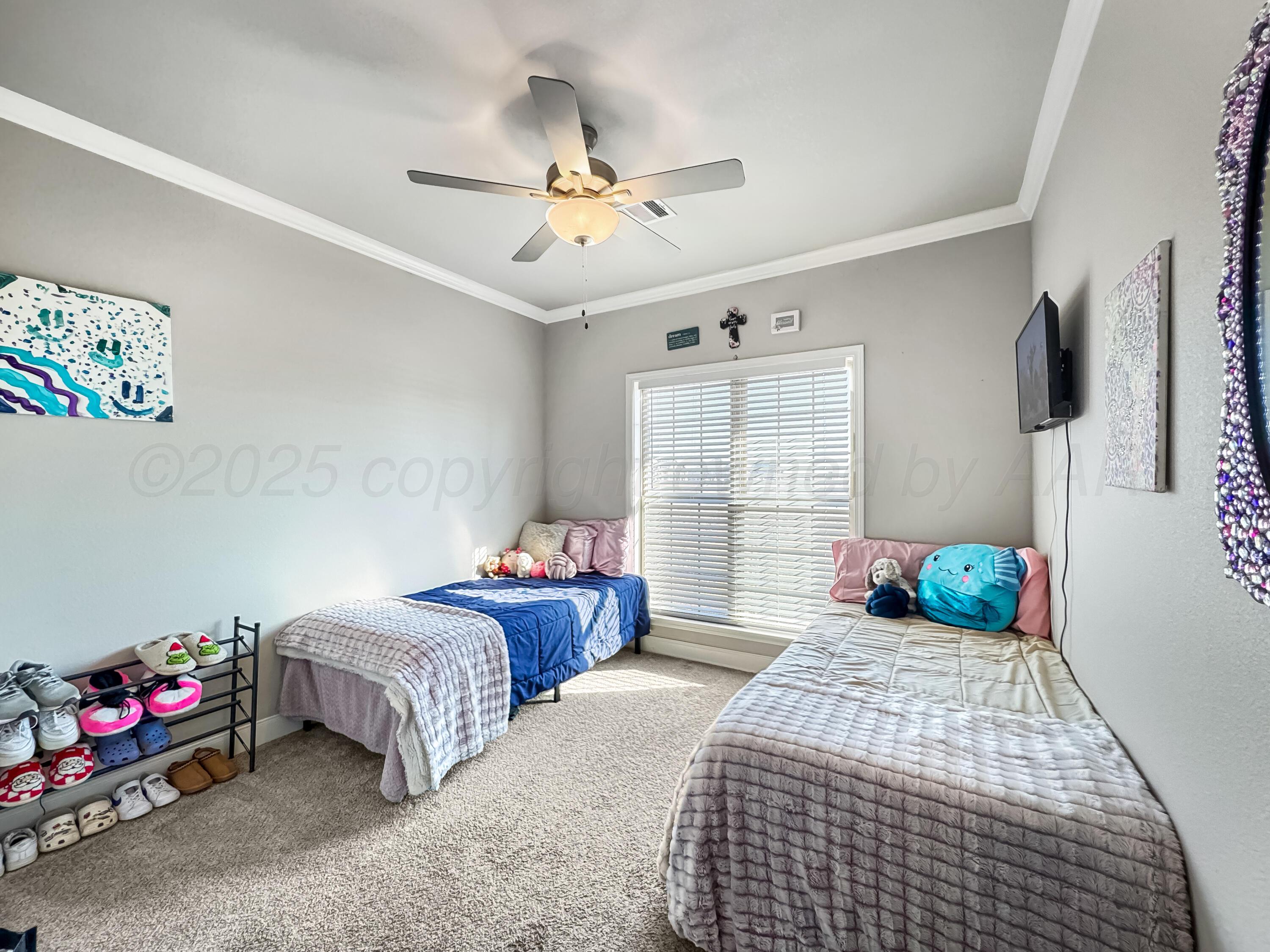 18300 Taurus Trail Canyon, TX 79015 - Photo 18 of 32 a bedroom with bed and a window