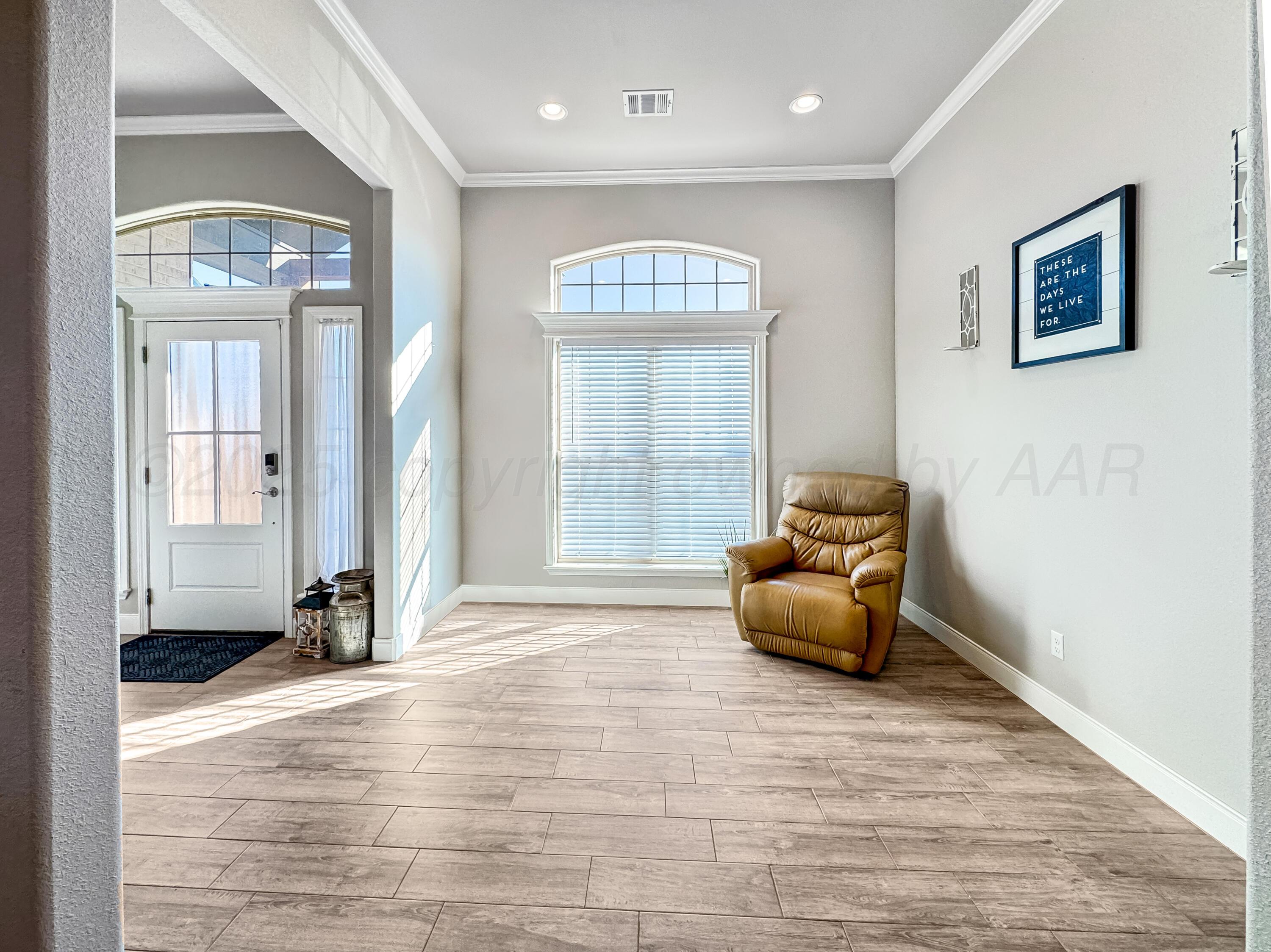 18300 Taurus Trail Canyon, TX 79015 - Photo 22 of 32 a living room with furniture and a large window