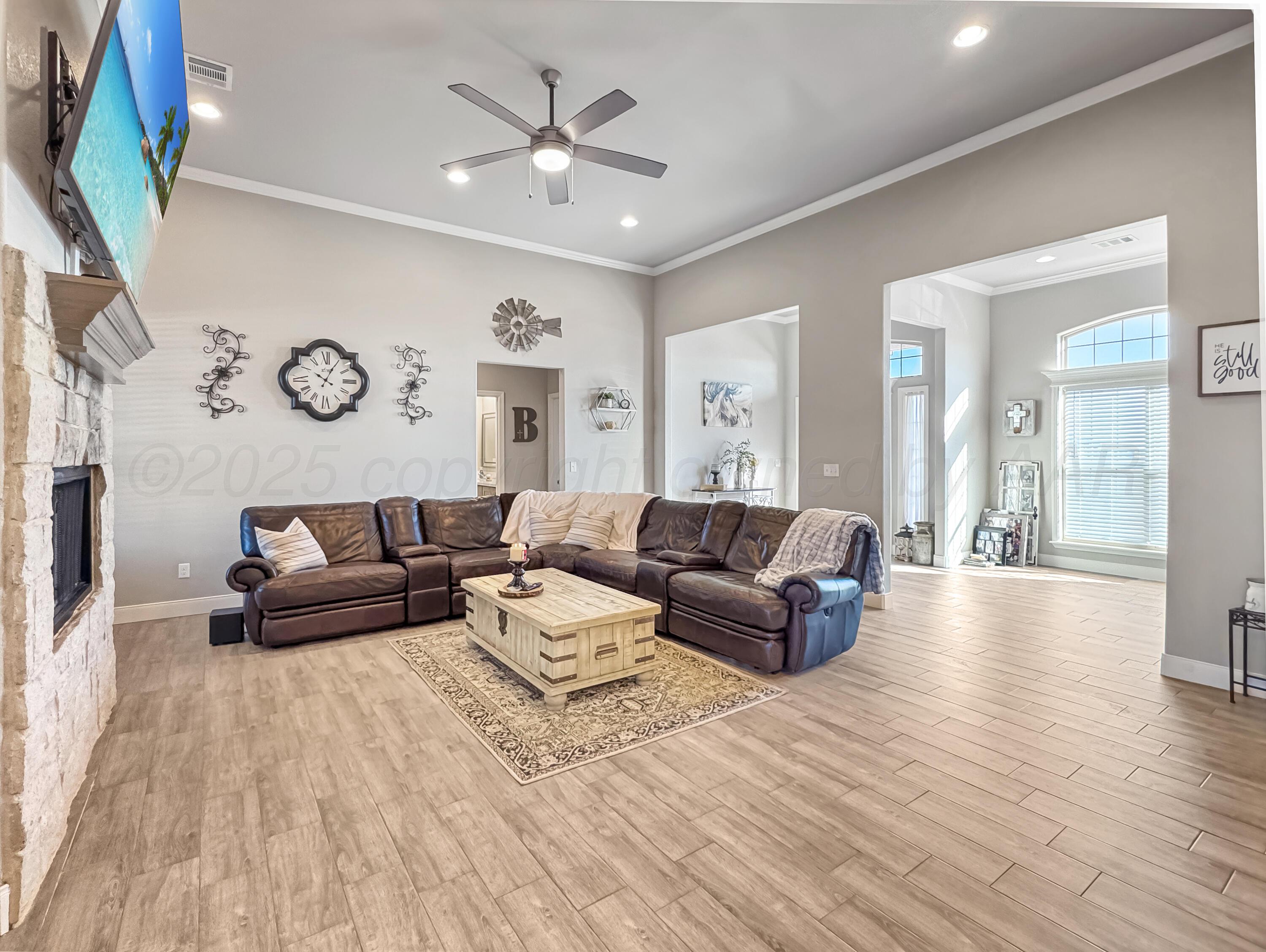 18300 Taurus Trail Canyon, TX 79015 - Photo 8 of 32 a living room with furniture and a wooden floor