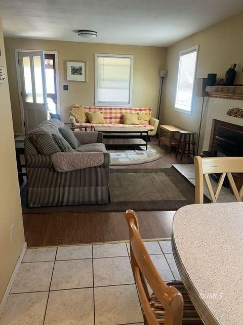 103 North Clay Street Independence, CA 93526 - Photo 8 of 25 a living room with furniture and wooden floor