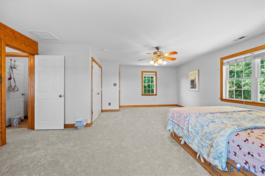 3137 Trenholm Road Powhatan, VA 23139 - Photo 37 of 72 a bedroom with a bed and a window
