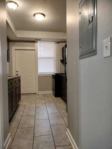 a bathroom with a sink a toilet and bathtub