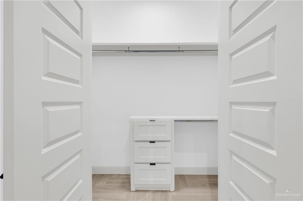 1515 Duke Street Mission, TX 78572 - Photo 17 of 33 a view of an empty walk in closet