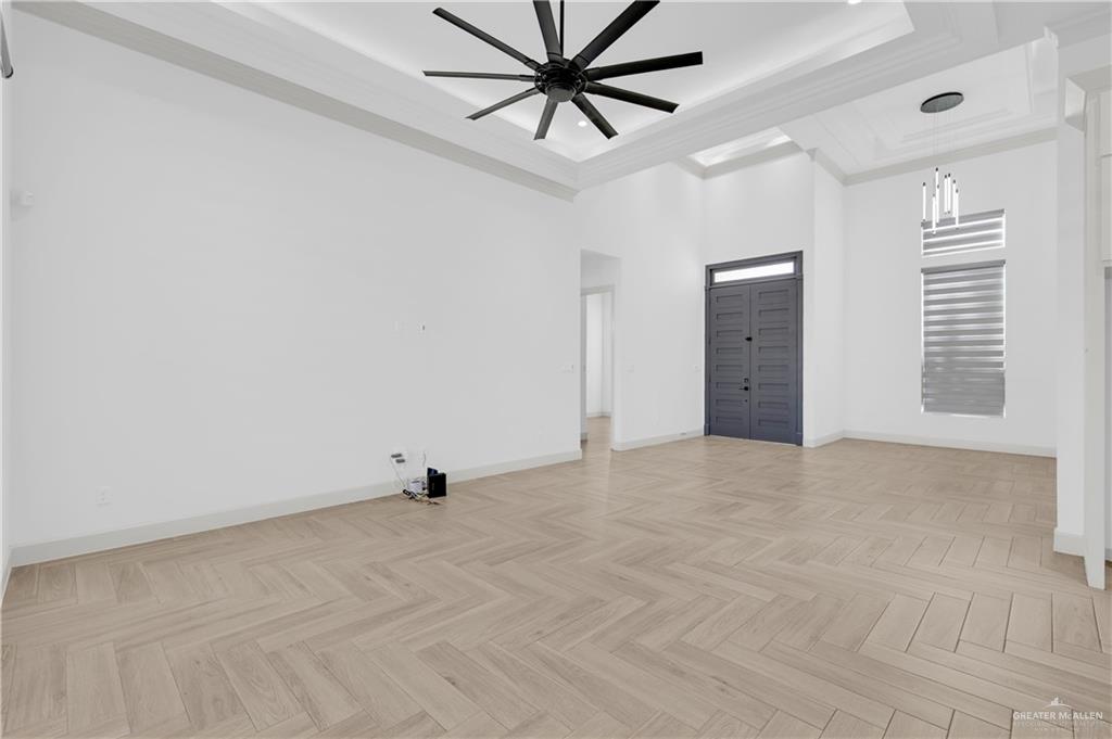 1515 Duke Street Mission, TX 78572 - Photo 4 of 33 a view of a livingroom with a ceiling fan and window