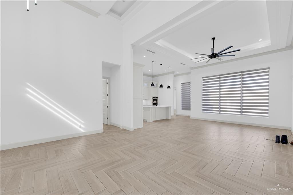 1515 Duke Street Mission, TX 78572 - Photo 5 of 33 an empty room with windows and ceiling fan