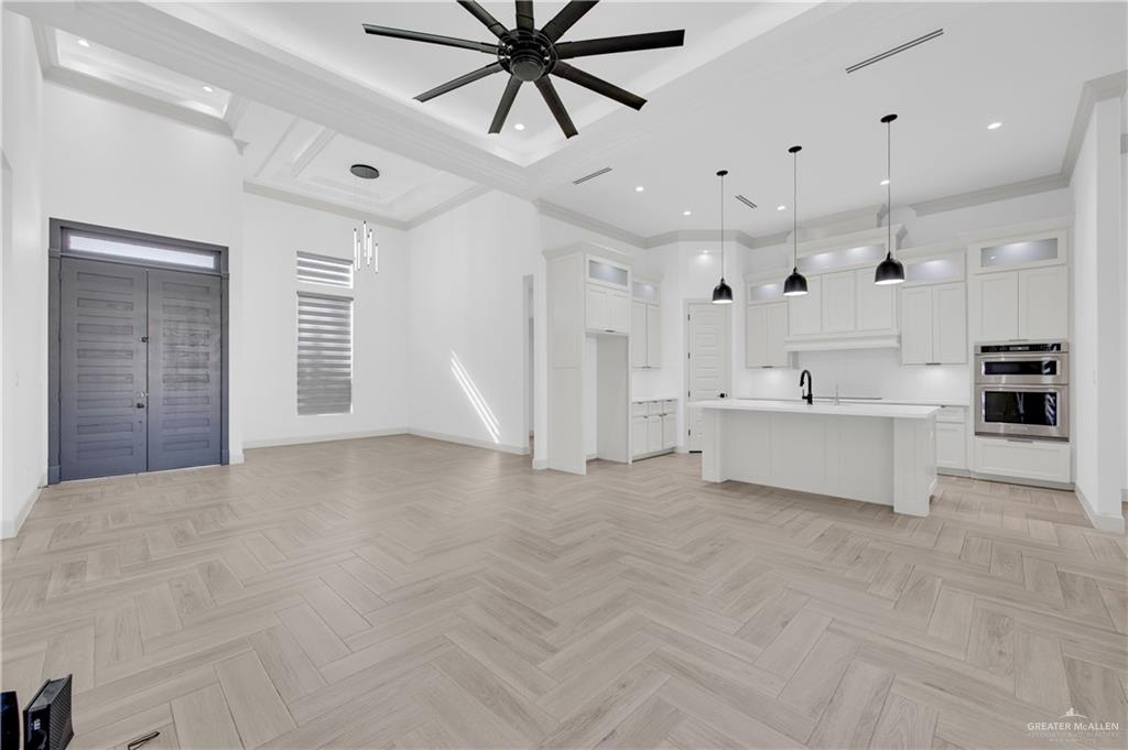1515 Duke Street Mission, TX 78572 - Photo 6 of 33 a view of an empty room with kitchen view and a window