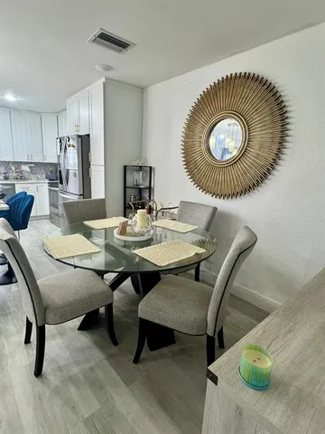 a view of a dining room and livingroom