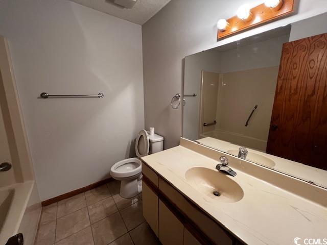 310 Lakeside Drive, Unit A Surfside Beach, SC 29575 - Photo 8 of 13 Full bathroom with tile patterned flooring, shower