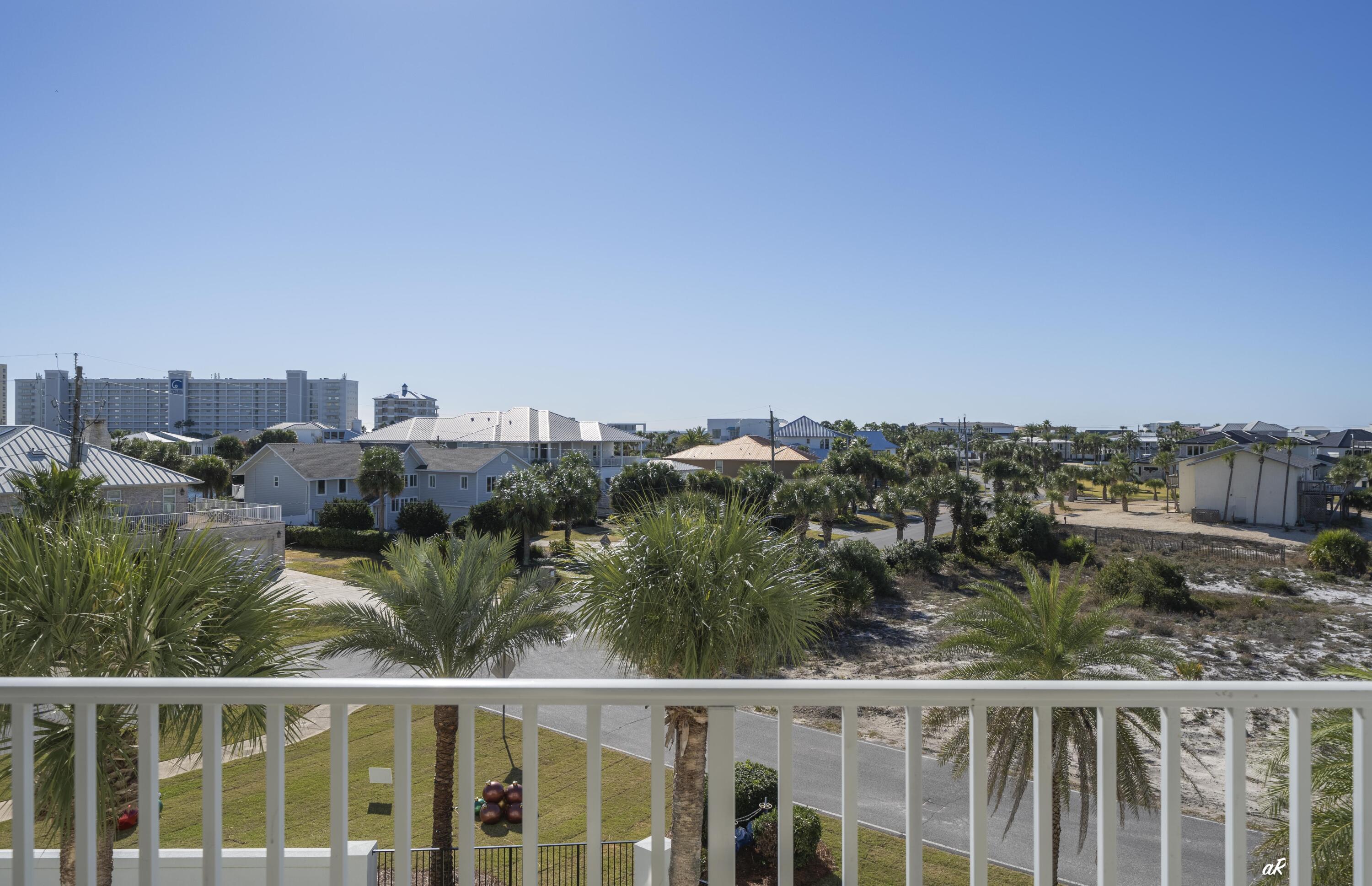 30 Moreno Point Road, Unit 404A Destin, FL 32541 - Photo 16 of 52 a view of a city from a balcony