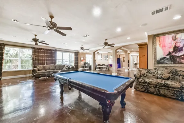 a view of a building with sitting area