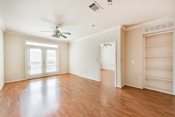 a kitchen with stainless steel appliances granite countertop a refrigerator a stove top oven a sink and dishwasher