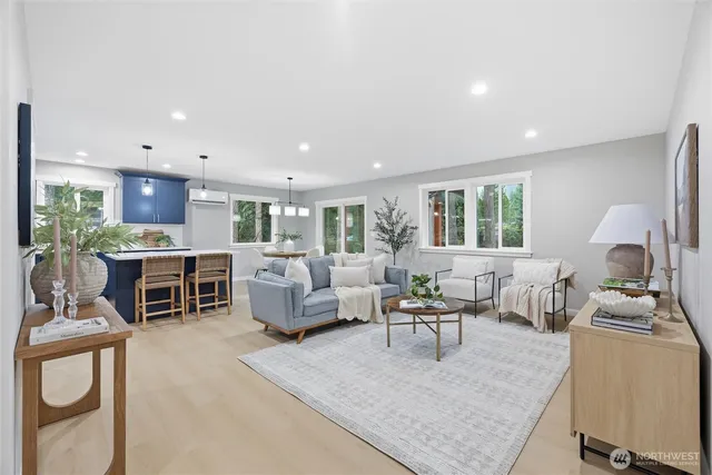 a living room with furniture and a table