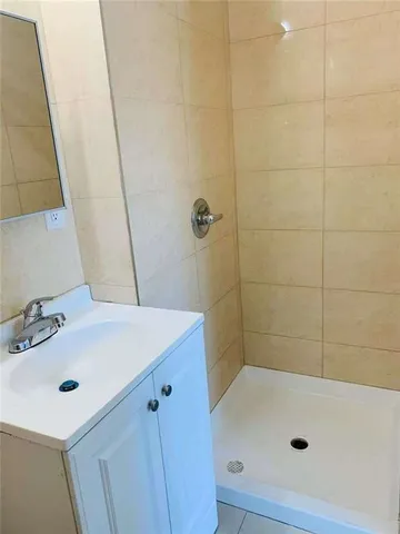 a bathroom with a bath tub