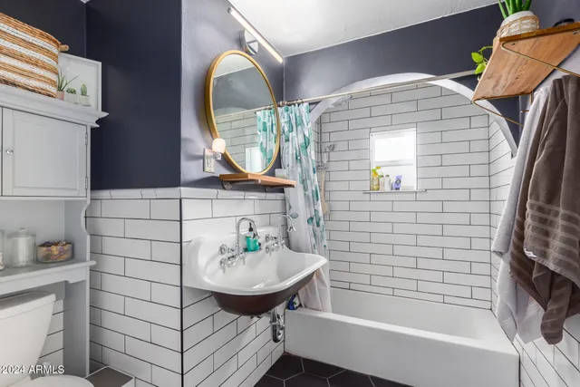 a bathroom with a sink and a bathtub