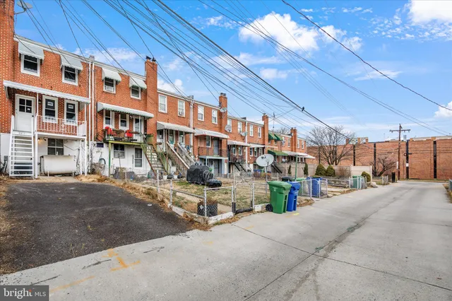 a view of a street with cars