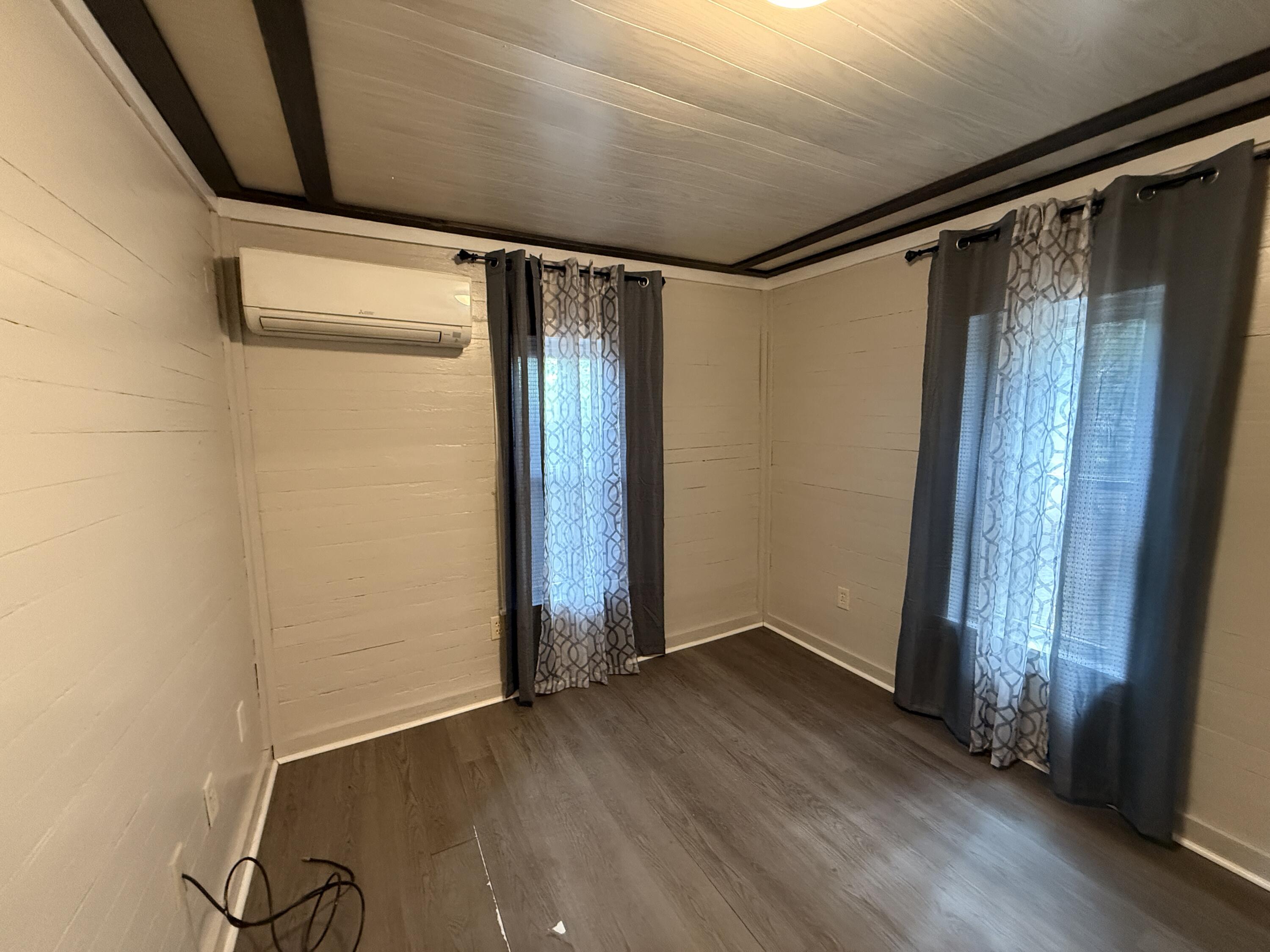 299 Carl Place Crestview, FL 32539 - Photo 26 of 37 a view of front door with wooden floor