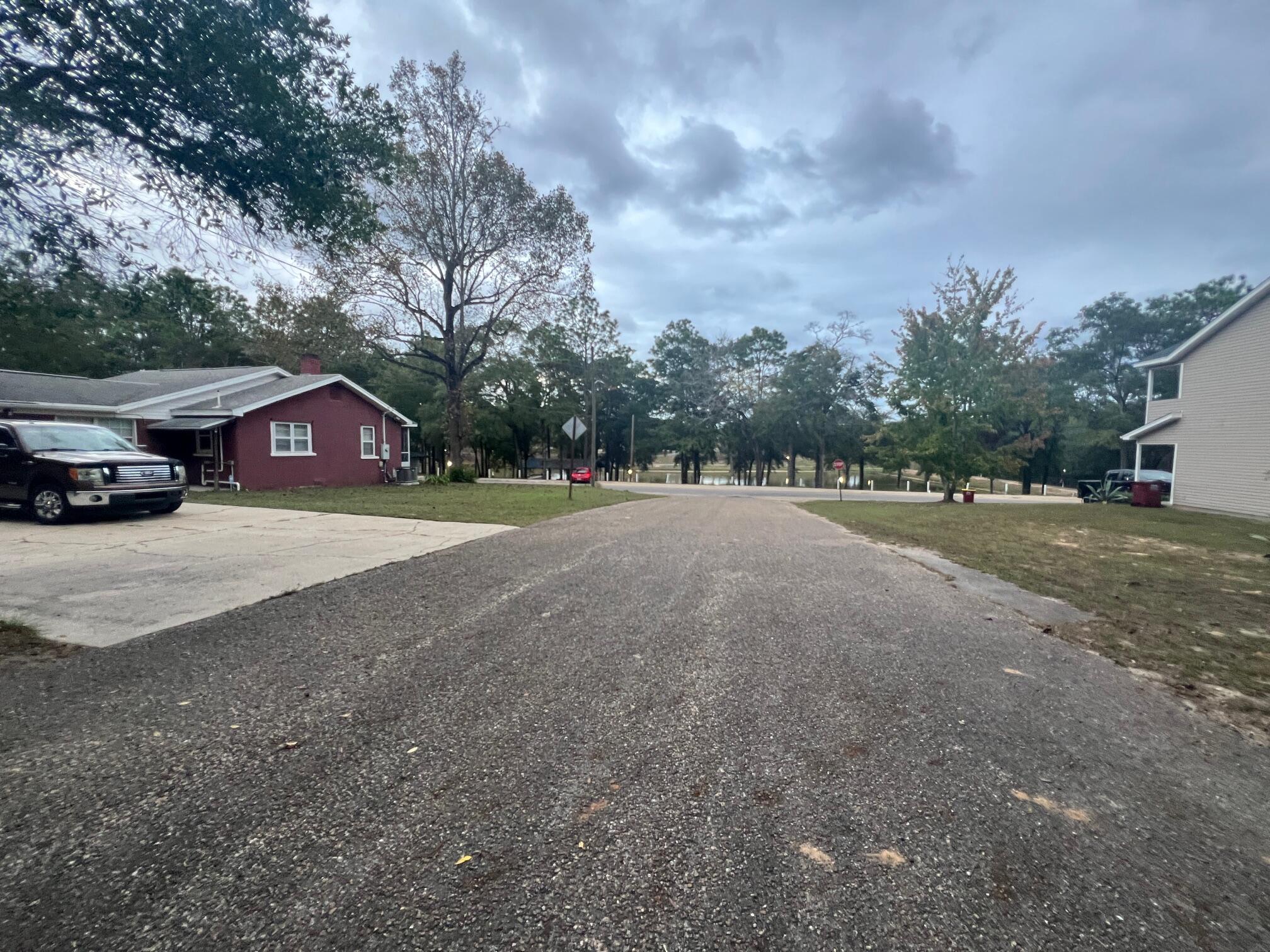 299 Carl Place Crestview, FL 32539 - Photo 36 of 37 a view of street with parked cars