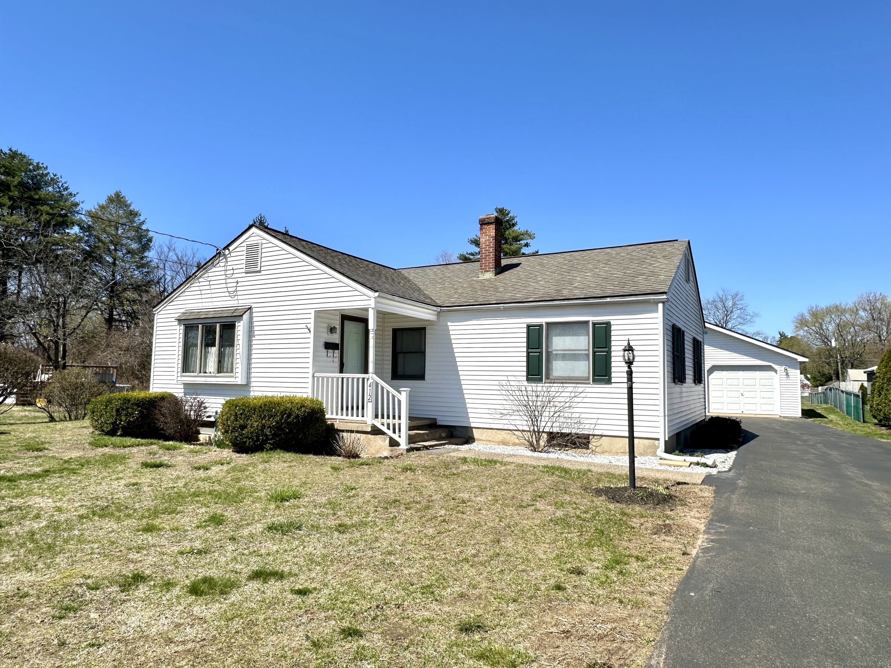 412 Halfway House Road Windsor Locks, CT 06096 - Photo 1 of 1 a view of a house with backyard and sitting area