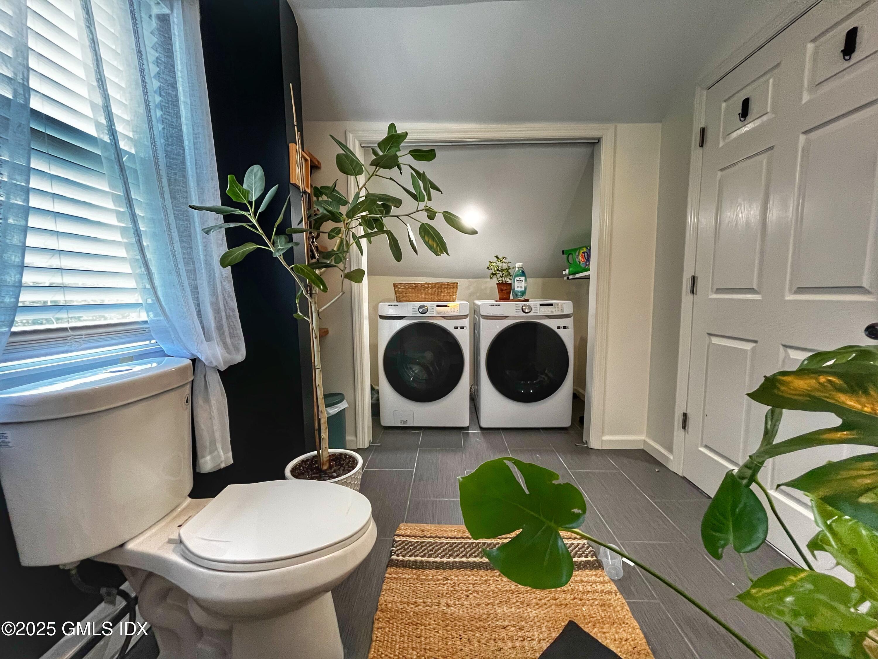 37 Gerry Street, Unit 2 Greenwich, CT 06830 - Photo 6 of 13 a bathroom with a toilet and a mirror