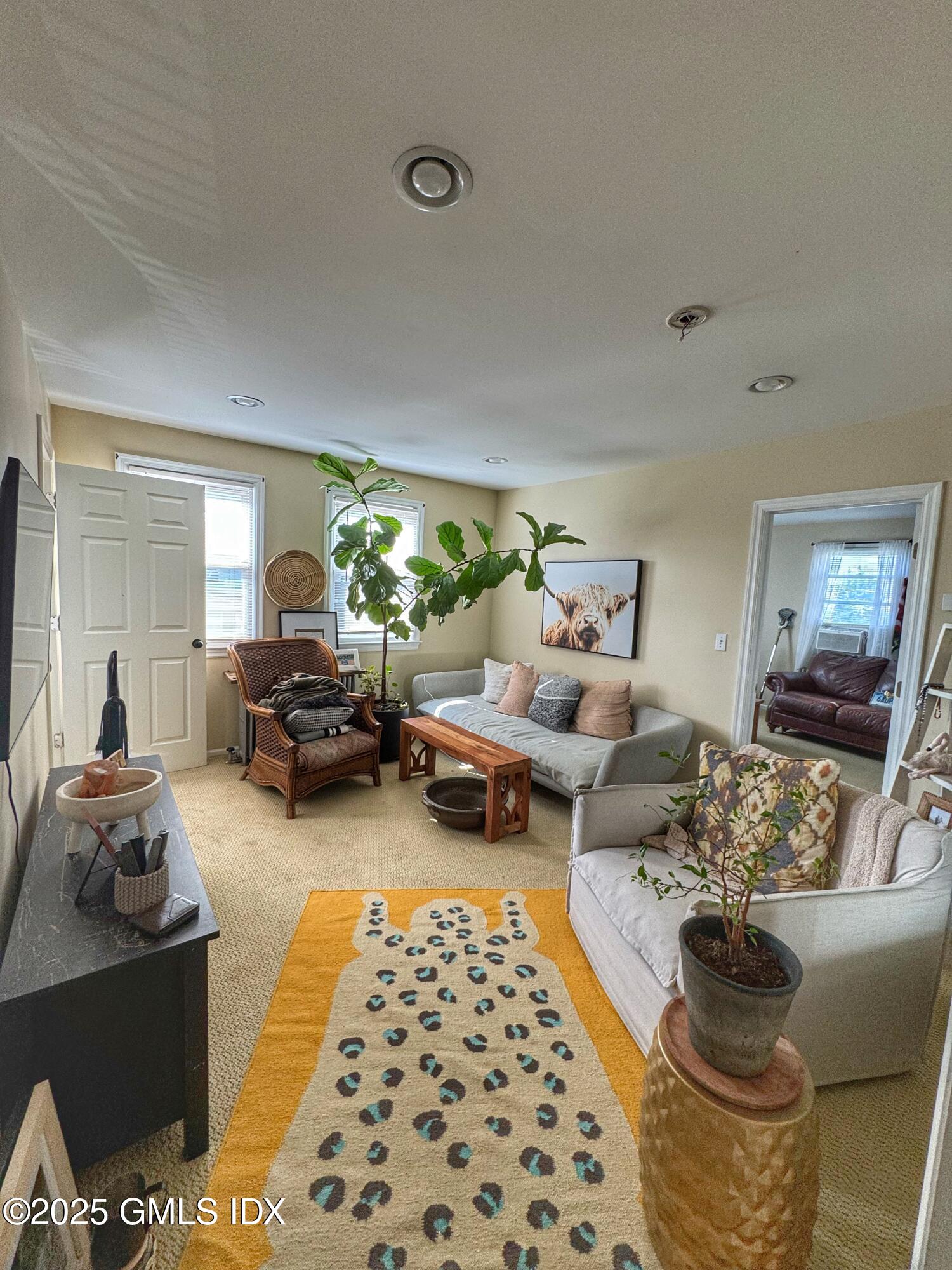 37 Gerry Street, Unit 2 Greenwich, CT 06830 - Photo 7 of 13 a living room with furniture and a couch