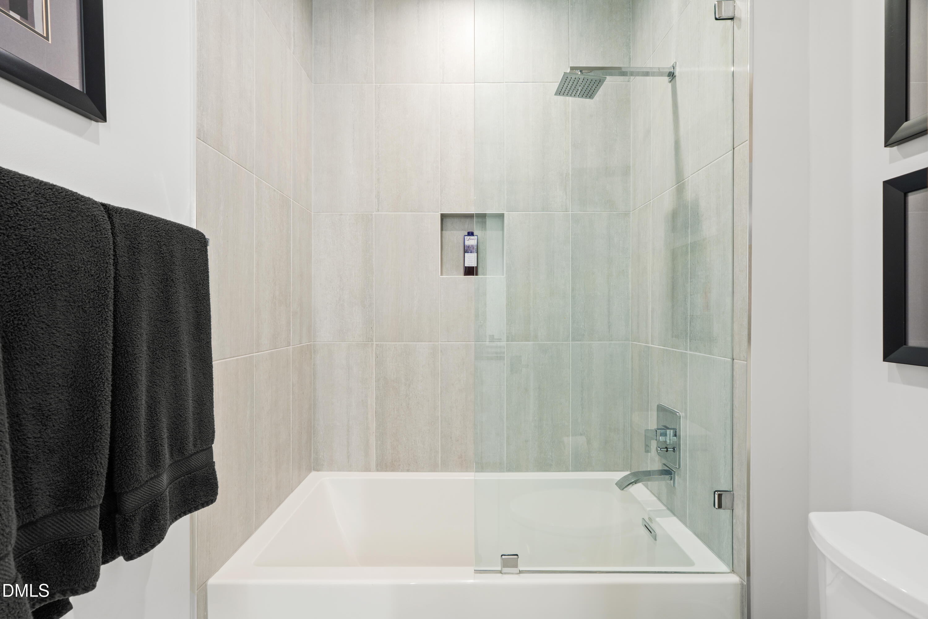 132 Edward Booth Lane Durham, NC 27713 - Photo 44 of 68 a bathroom with a white bath tub