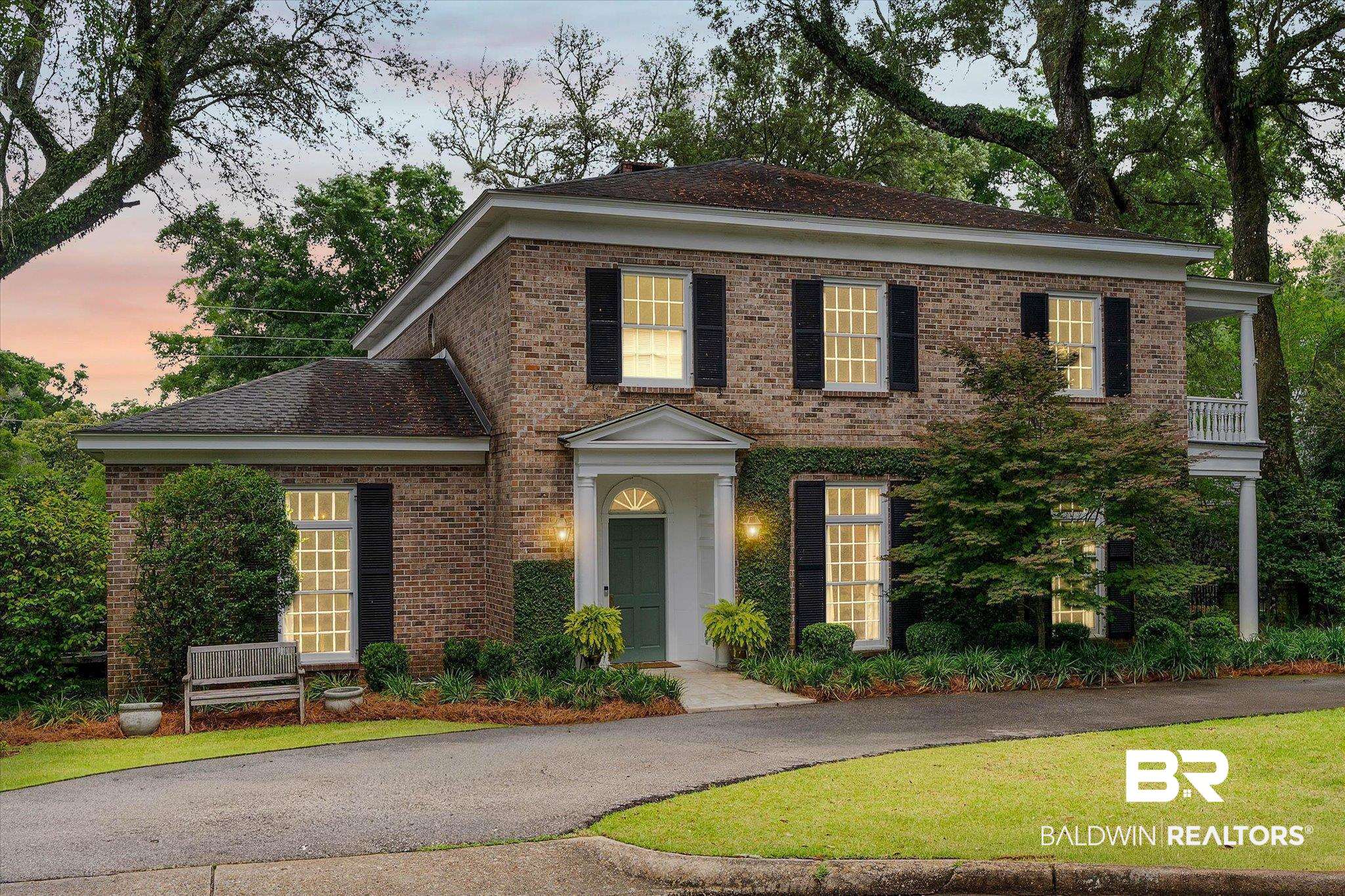 3908 Yester Place Mobile, AL 36608 - Photo 4 of 45 Brick exterior residence featuring a covered front entry with white columns
