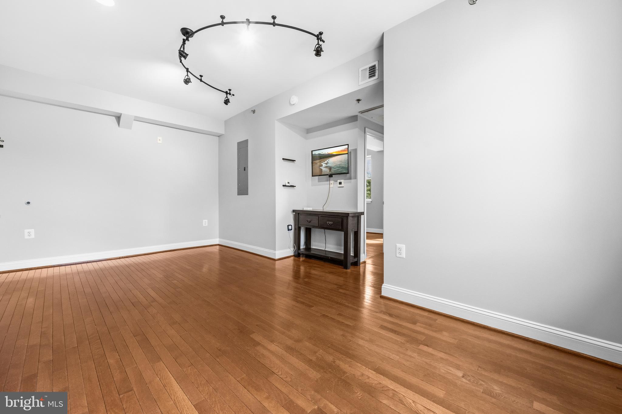 1831 2nd Street Northeast, Unit 207 Washington, DC 20002 - Photo 9 of 33 a view of empty room with wooden floor